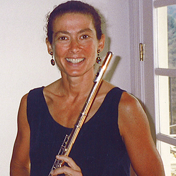 Rachel Rudich holding a flute